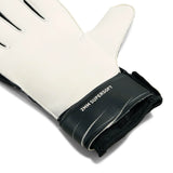 White glove with black wristband labeled '2MM SUPERSOFT' on a white background