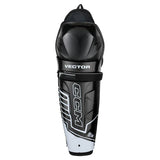 A CCM Vector ice hockey shin guard in black and white, featuring the CCM logo and 'VECTOR' text on a clean white background.