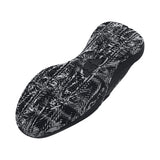 Black and gray patterned sandal on a white background