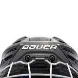 Black Bauer helmet and mask on a white background
