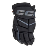 A black CCM hockey glove with gray and silver logo details on the wrist strap and light gray accent lines on the fingers, shown against a plain white background.