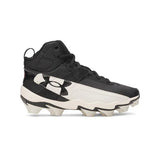 Black and white cleated shoe with Under Armour logo on a white background