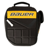 Black, gold, white Bauer bag on a white background