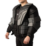 Person wearing a black and gray protective vest on a white background