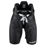 Black CCM hockey pants with white drawstrings and white CCM branding on the lower leg, shown against a plain white background.