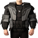 Person wearing a black and gray Bauer protective vest on a white background