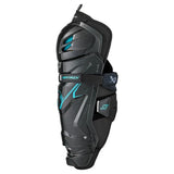 Side view of a black and green shin pad on a white background