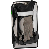 Gloves in a black and white glove case on a white background