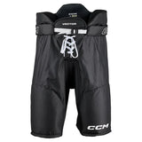Black CCM hockey pants with white laces and white CCM logos, shown against a plain white background.