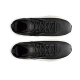 Black athletic shoes with white sole on a white background