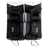 Back view of a pair of Bauer white and black goalie pads on a white background