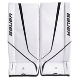 Bauer white and black goalie pads on a white background