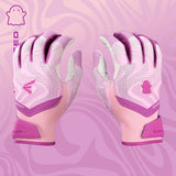 Pair of pink and purple batting gloves on a matching pink background