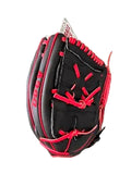 A black baseball glove with bright red laces and trim, photographed on a gray textured surface.