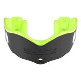 A mouthguard with a black lower section and a bright neon green upper section, featuring the brand name 'SHOCK' embossed on the front, set against a plain white background.