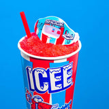 Red slushy in a colorful 'ICEE' cup with a straw against a blue background