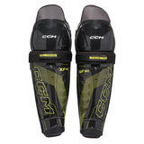Pair of CCM hockey shin guards on a white background