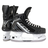 Pair of CCM hockey skates on a white background