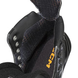 Close-up of a black and gray shoe with plaid pattern and 'KCC' branding on a white background