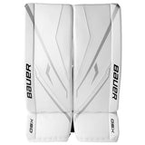White Bauer goalie leg guards with gray graphic accents and black brand lettering, shown against a plain white background.