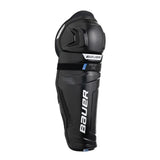 Black and blue Bauer hockey shin pad  on a white background