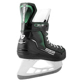 Black and green Bauer hockey skate on a white background
