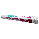 A close-up of a CCM Robcor Titanium hockey stick shaft showing the white textured wrap with pink, teal, and dark red branding.