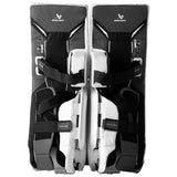 Pair of black and white hockey goalie leg pads with Bauer branding on a white background
