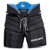 Black hockey goalie pants with blue accents and Bauer branding on a white background