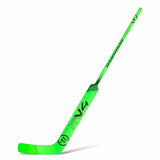A bright neon green hockey stick, specifically the Warrior V4 model with a TF blade, shown diagonally on a clean white background.